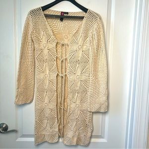 Beautiful crocheted cream colored long cardigan by Say What, size medium